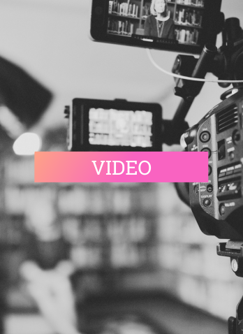 "Video" text with black and white photo of camera recording